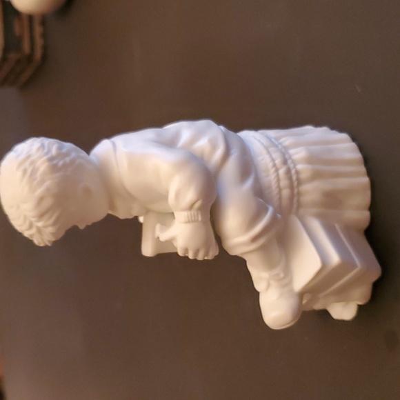 Boy with train figurine - Picture 2 of 5